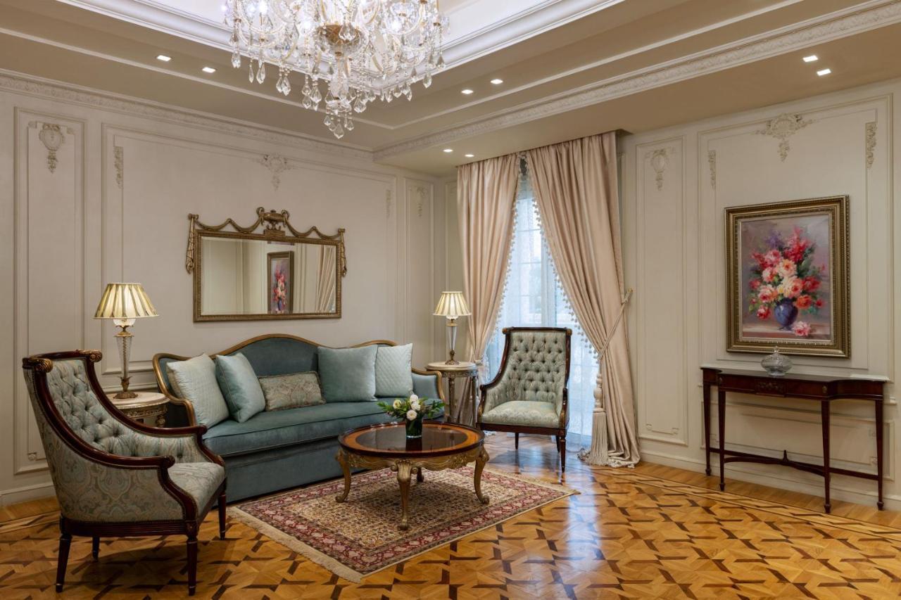 The St Regis New Capital Cairo Hotel Exterior photo A living room in a suite at the Four Seasons Hotel, Moscow