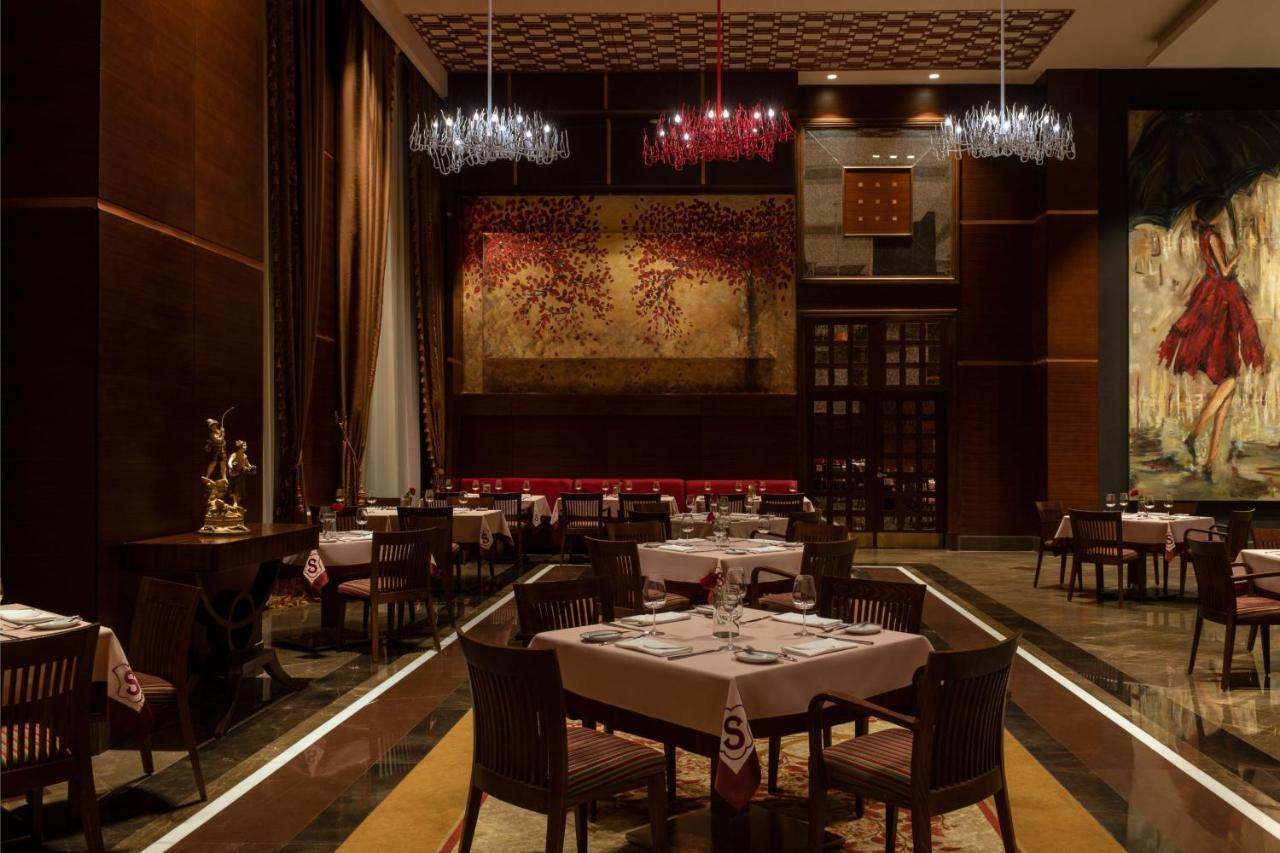 The St Regis New Capital Cairo Hotel Exterior photo The interior of the restaurant